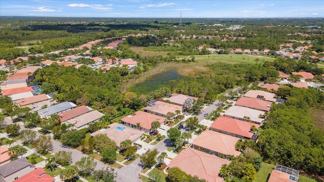 aerial view of property's location with nearby suburban area