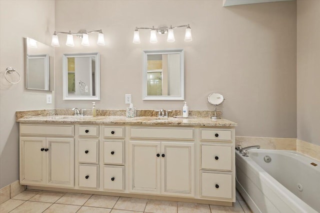 bathroom with tile patterned flooring, double vanity, and a jetted tub