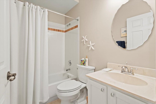 full bath with toilet, vanity, and shower / bath combo