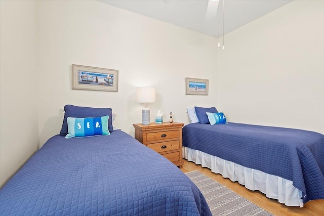 bedroom with wood finished floors