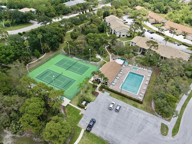 view of property location featuring a pool area