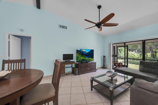 living area featuring high vaulted ceiling, light tile patterned floors, and ceiling fan