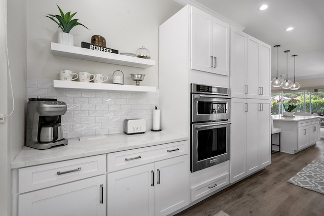 kitchen featuring stainless steel double oven, recessed lighting, white cabinets, tasteful backsplash, and open shelves