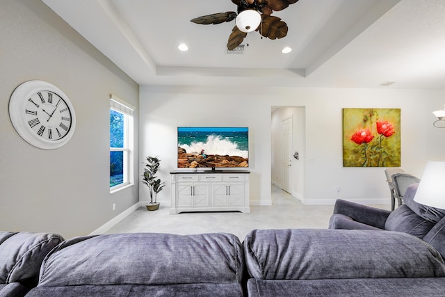 10250 SW Azzo Ln, Port Saint Lucie, FL 34986 - living area with a ceiling fan, baseboards, recessed lighting, and a tray ceiling