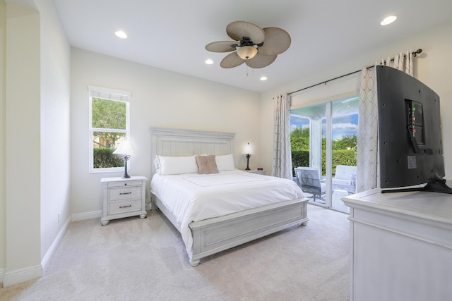 10250 SW Azzo Ln, Port Saint Lucie, FL 34986 - bedroom featuring access to outside, multiple windows, light carpet, and recessed lighting