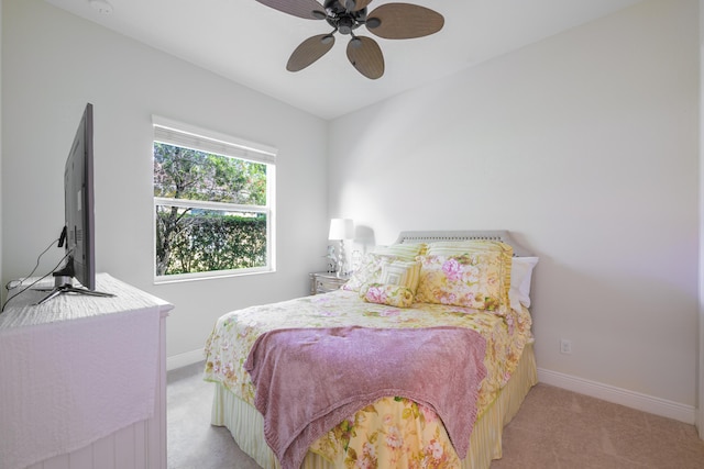 10250 SW Azzo Ln, Port Saint Lucie, FL 34986 - bedroom featuring light carpet, baseboards, and ceiling fan