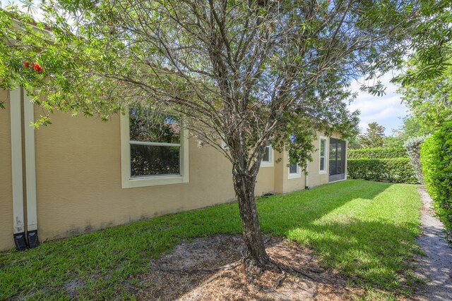 10250 SW Azzo Ln, Port Saint Lucie, FL 34986 - view of green lawn