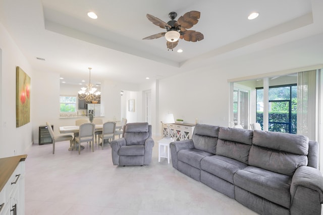 10250 SW Azzo Ln, Port Saint Lucie, FL 34986 - living area with plenty of natural light, a chandelier, a tray ceiling, and recessed lighting
