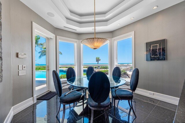 3066 SE Dune Dr, Stuart, FL 34996 - dining space featuring baseboards, granite tiled floors, and recessed lighting