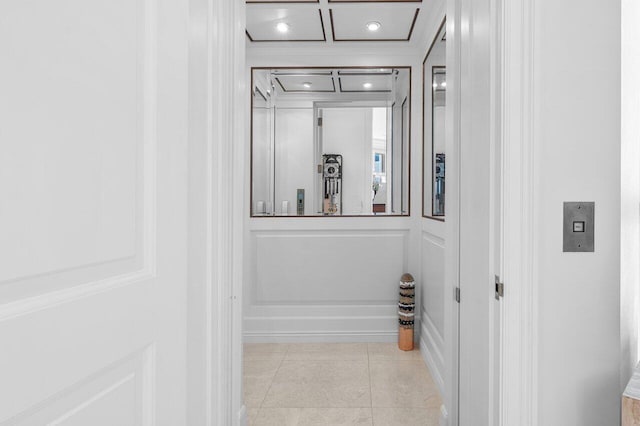 3066 SE Dune Dr, Stuart, FL 34996 - corridor with light tile patterned flooring and elevator