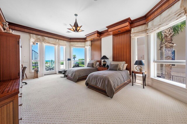 3066 SE Dune Dr, Stuart, FL 34996 - bedroom featuring access to outside, light carpet, and ornamental molding