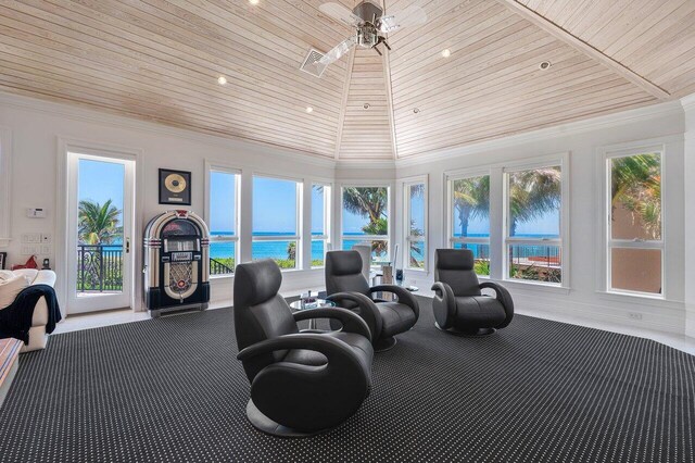 3066 SE Dune Dr, Stuart, FL 34996 - interior space featuring carpet floors, wood ceiling, plenty of natural light, a water view, and ceiling fan
