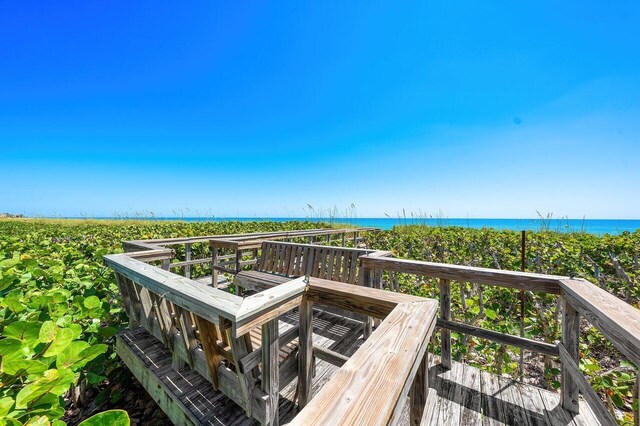 3066 SE Dune Dr, Stuart, FL 34996 - deck with view of water and beach