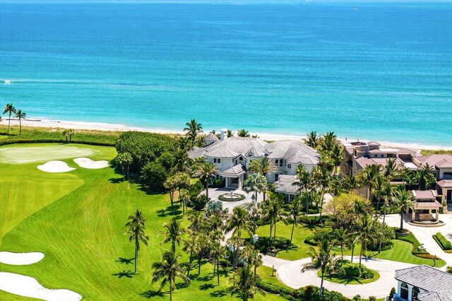 3066 SE Dune Dr, Stuart, FL 34996 - aerial perspective of suburban area with expansive coastline and a golf club