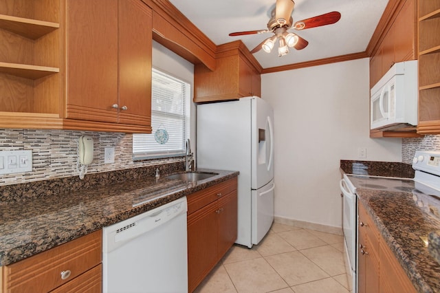 228 Brittany E, Delray Beach, FL 33446 - kitchen with white appliances, open shelves, tasteful backsplash, a ceiling fan, and brown cabinetry