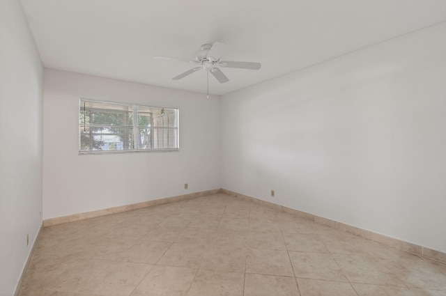 228 Brittany E, Delray Beach, FL 33446 - spare room with ceiling fan and light tile patterned floors