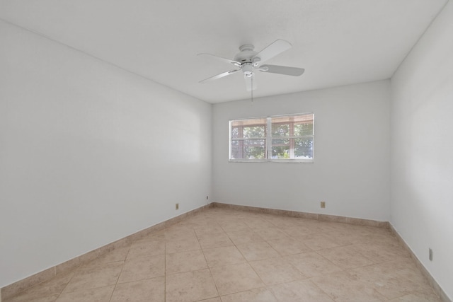 228 Brittany E, Delray Beach, FL 33446 - spare room with ceiling fan and light tile patterned floors