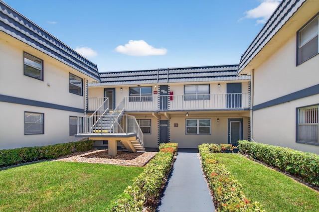 228 Brittany E, Delray Beach, FL 33446 - view of property with stairs