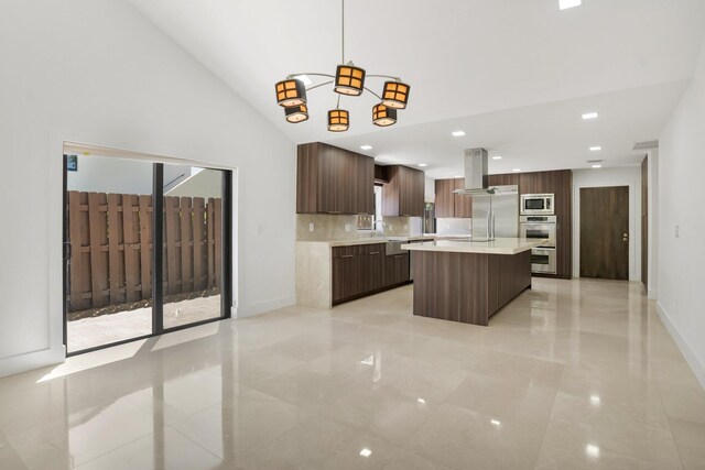 21922 Cypress Dr Unit 37B, Boca Raton, FL 33433 - kitchen featuring modern cabinets, stainless steel appliances, light countertops, island exhaust hood, and hanging light fixtures