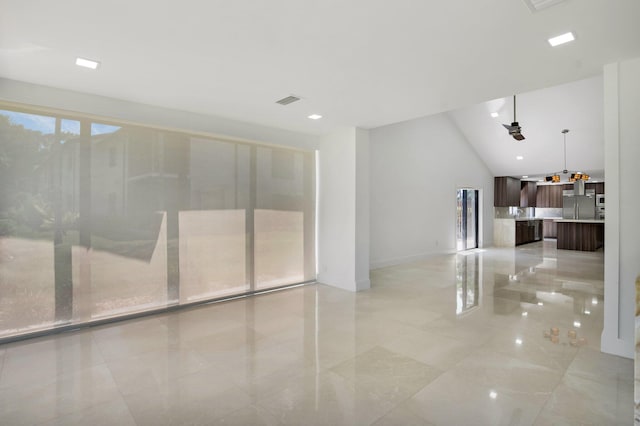 21922 Cypress Dr Unit 37B, Boca Raton, FL 33433 - unfurnished living room featuring baseboards and high vaulted ceiling