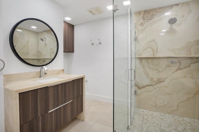 21922 Cypress Dr Unit 37B, Boca Raton, FL 33433 - bathroom featuring a marble finish shower, vanity, and tile patterned floors