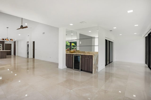 21922 Cypress Dr Unit 37B, Boca Raton, FL 33433 - unfurnished living room featuring wine cooler, a dry bar, a ceiling fan, and recessed lighting
