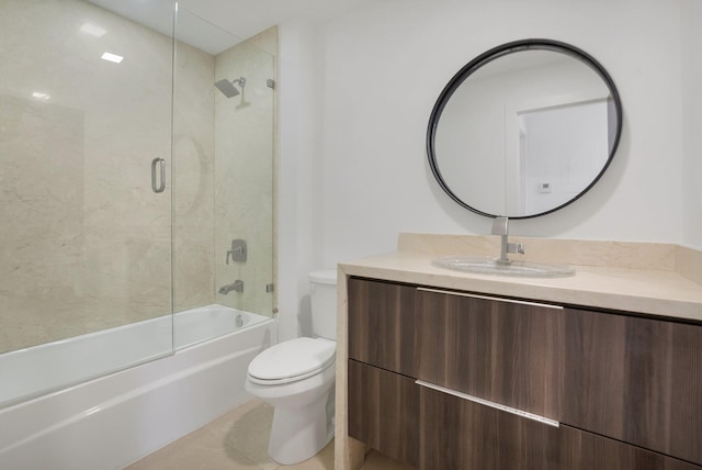 21922 Cypress Dr Unit 37B, Boca Raton, FL 33433 - bathroom featuring toilet, vanity, and bath / shower combo with glass door