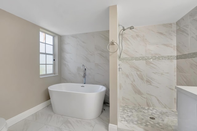 7655 Cinebar Dr Unit 105, Boca Raton, FL 33433 - full bathroom featuring tiled shower, a freestanding bath, marble look tile flooring, and baseboards