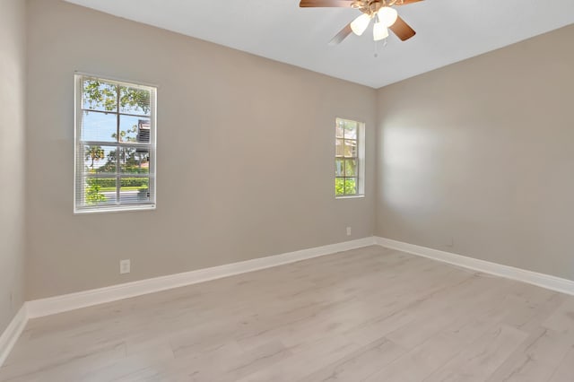 7655 Cinebar Dr Unit 105, Boca Raton, FL 33433 - unfurnished room featuring ceiling fan and baseboards