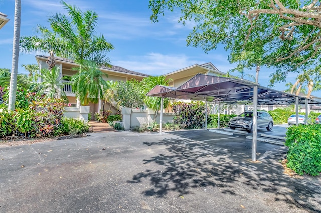 7655 Cinebar Dr Unit 105, Boca Raton, FL 33433 - view of covered parking lot