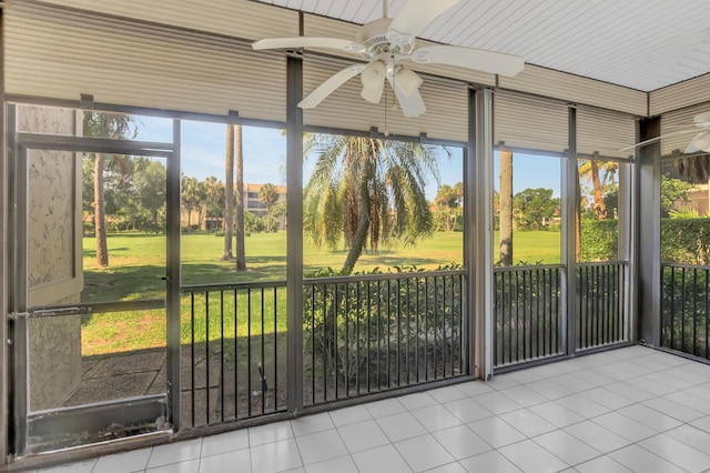 7655 Cinebar Dr Unit 105, Boca Raton, FL 33433 - unfurnished sunroom featuring a ceiling fan, view of golf course, and plenty of natural light