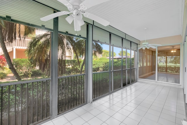 7655 Cinebar Dr Unit 105, Boca Raton, FL 33433 - unfurnished sunroom featuring ceiling fan