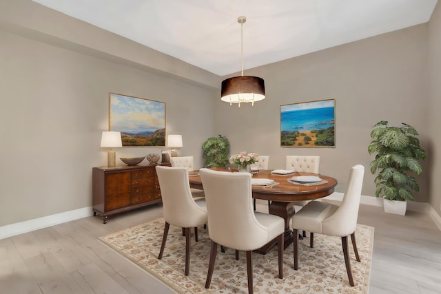 7655 Cinebar Dr Unit 105, Boca Raton, FL 33433 - dining space featuring light wood-style floors and baseboards