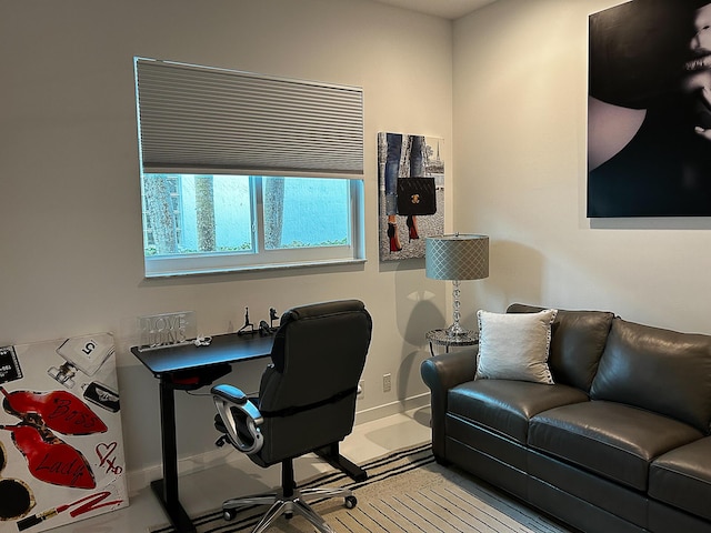 office space featuring baseboards