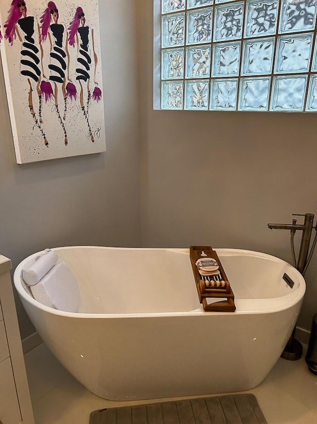 bathroom featuring a freestanding bath