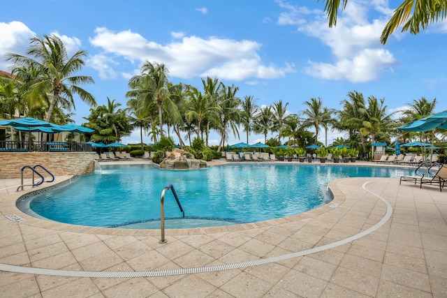 community pool featuring a patio area