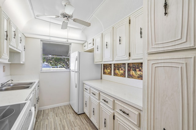 195 High Point Ter E Unit C, Delray Beach, FL 33445 - kitchen with a sink, electric range oven, a ceiling fan, baseboards, and light countertops