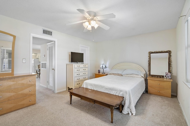 195 High Point Ter E Unit C, Delray Beach, FL 33445 - bedroom with light carpet, ceiling fan, and baseboards