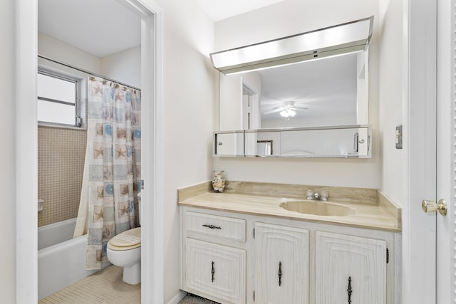 195 High Point Ter E Unit C, Delray Beach, FL 33445 - bathroom featuring toilet, vanity, ceiling fan, tile patterned flooring, and shower / bath combination with curtain