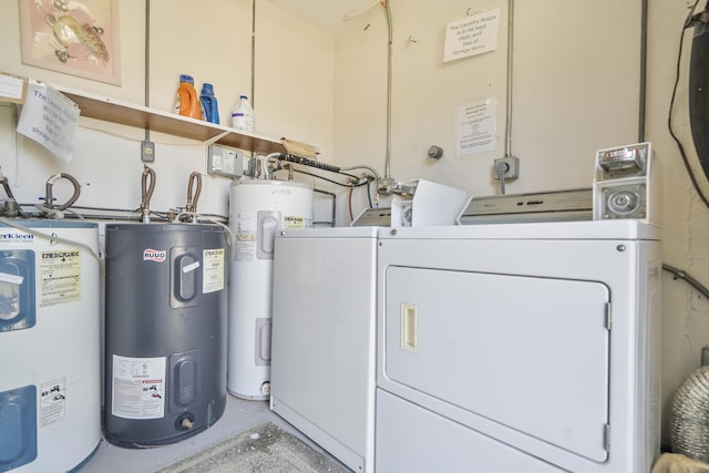 195 High Point Ter E Unit C, Delray Beach, FL 33445 - laundry room with electric water heater and washer and clothes dryer