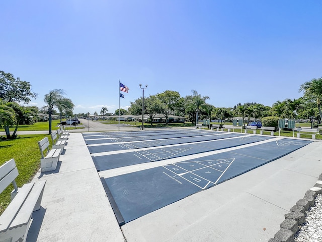 195 High Point Ter E Unit C, Delray Beach, FL 33445 - view of property's community featuring uncovered parking, shuffleboard, and a yard