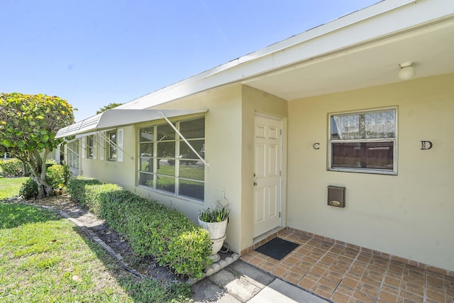 195 High Point Ter E Unit C, Delray Beach, FL 33445 - property entrance with stucco siding