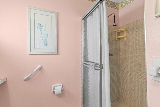 bathroom featuring a stall shower