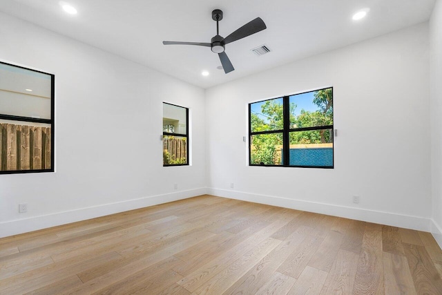 1105 NE 2nd Ave, Delray Beach, FL 33444 - spare room featuring light wood-type flooring, ceiling fan, recessed lighting, and baseboards