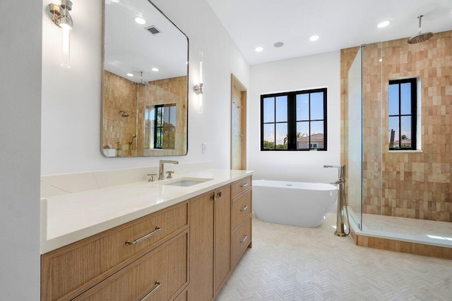 1105 NE 2nd Ave, Delray Beach, FL 33444 - full bathroom with tiled shower, a soaking tub, vanity, and recessed lighting