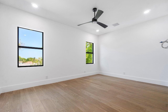 1105 NE 2nd Ave, Delray Beach, FL 33444 - spare room with light wood-style floors, recessed lighting, baseboards, and ceiling fan