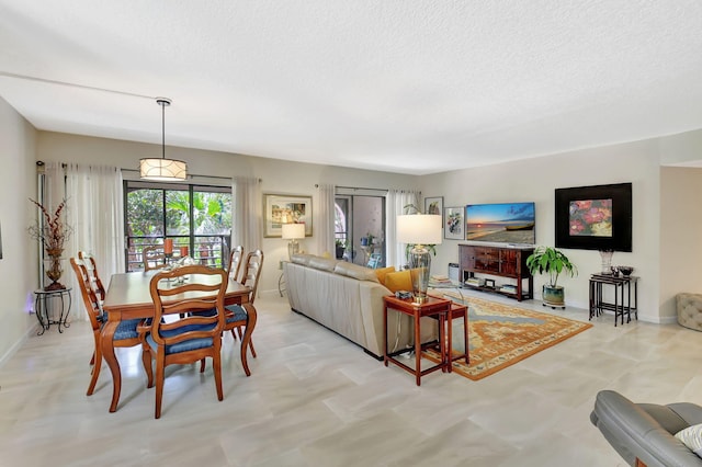 6328 Longboat Ln Unit 302, Boca Raton, FL 33433 - living area with a textured ceiling and baseboards