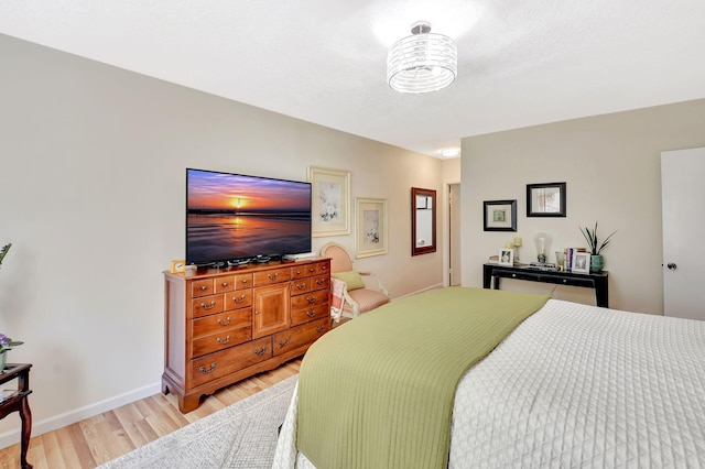 6328 Longboat Ln Unit 302, Boca Raton, FL 33433 - bedroom with light wood-style floors and baseboards