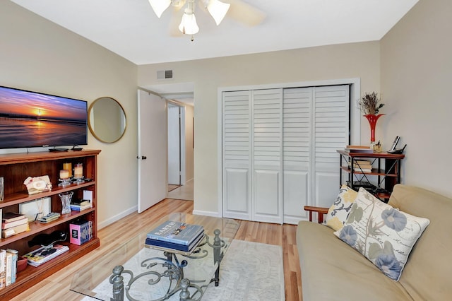 6328 Longboat Ln Unit 302, Boca Raton, FL 33433 - living room with light wood-style flooring, ceiling fan, and baseboards
