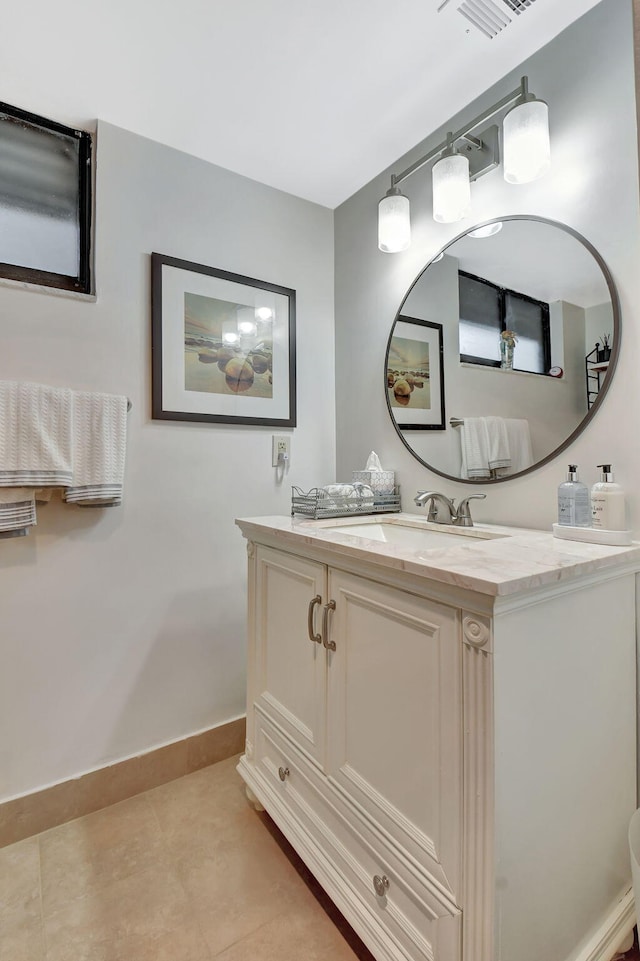 6328 Longboat Ln Unit 302, Boca Raton, FL 33433 - bathroom featuring vanity, baseboards, and tile patterned floors